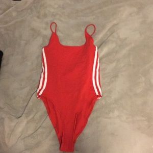 Red adidas body suit